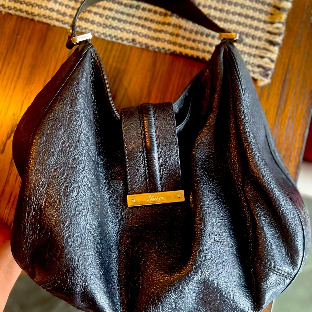 Black Guccisma handbag.  Used but in good condition!